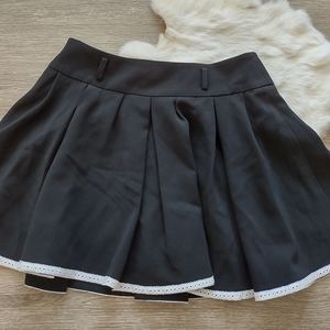 Black pleated skirt with lace trim Size 3